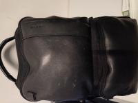 CS406/2024 BLACK BACKPACK WITH VARIOUS ITEMS INSIDE 